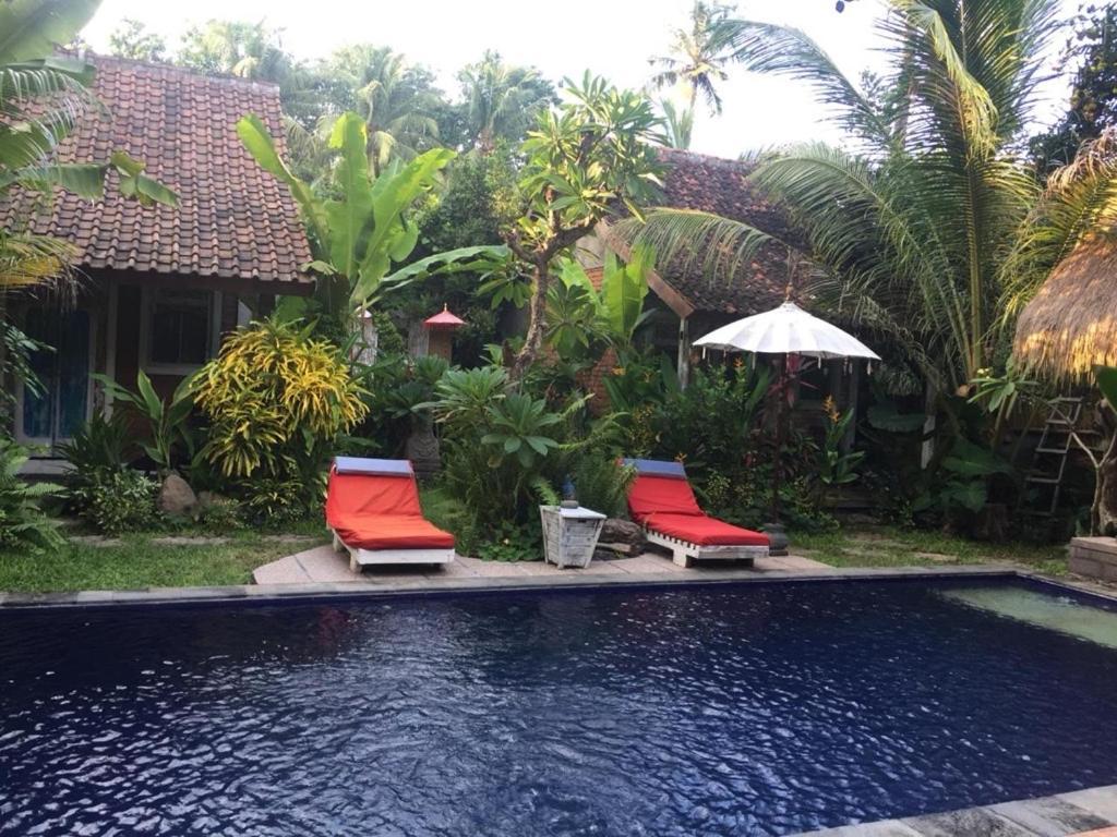 Pranajaya Villa เตจากูลา ภายนอก รูปภาพ